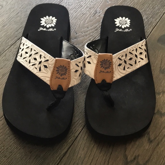 white yellow box flip flops